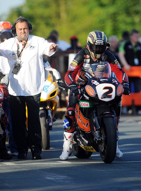 John McGuinness, the 14-times TT winner and outright lap record holder, prepares for first practice (Stephen Davison/Pacemaker Press International)
